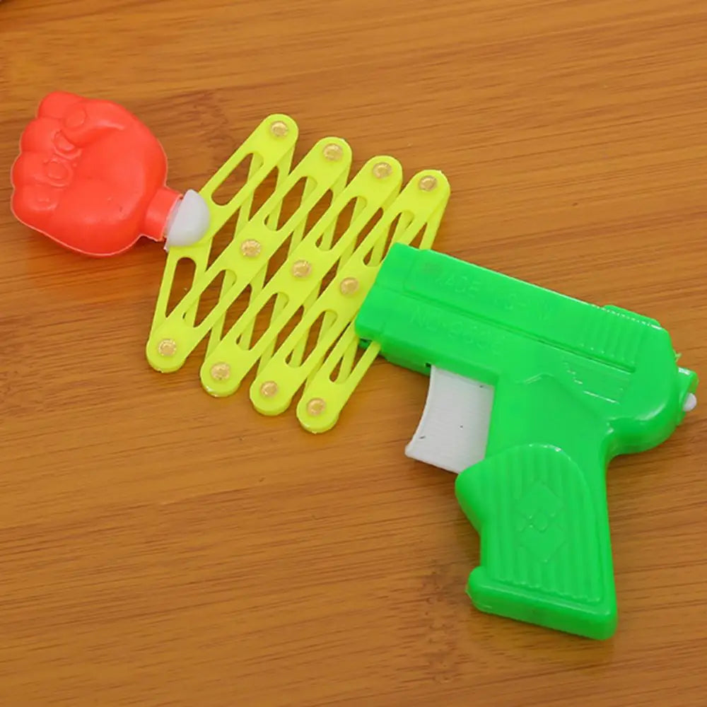 Retractable Fist Shooter Trick Toy Gun Funny Child Kids Plastic