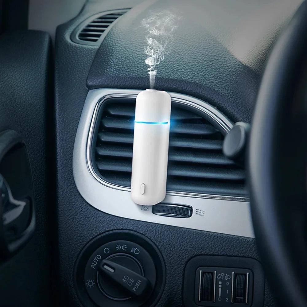 Car Air Freshener Perfume Vent Clip Electric Aroma Diffuser Cordless with 6 Scent