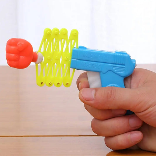 Retractable Fist Shooter Trick Toy Gun Funny Child Kids Plastic