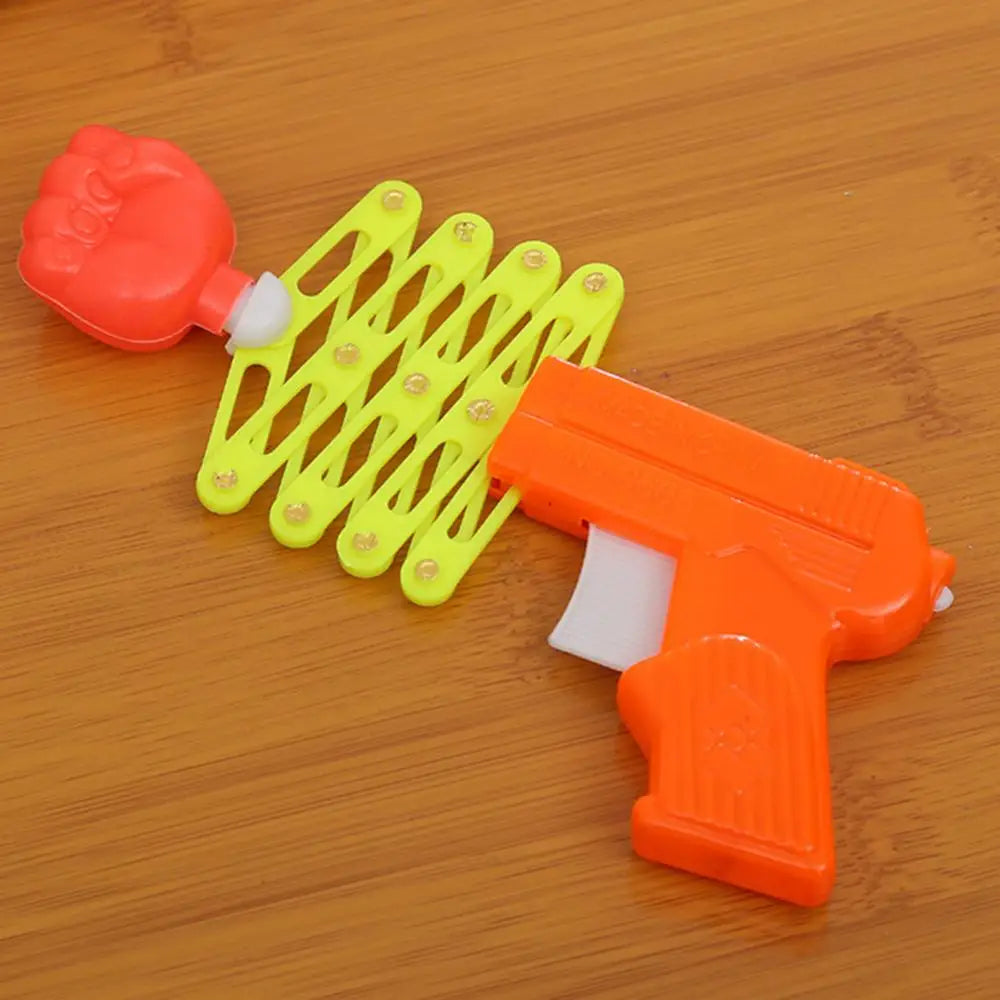 Retractable Fist Shooter Trick Toy Gun Funny Child Kids Plastic